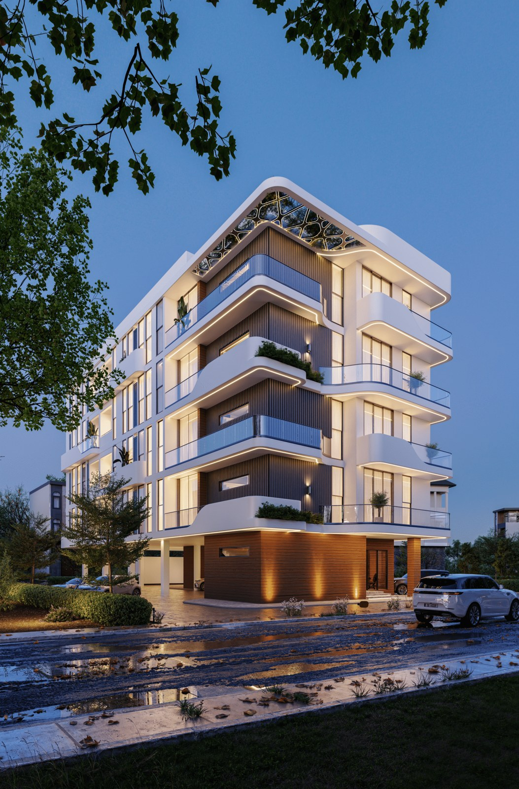 Pennek Heights apartment building with curved balconies at twilight in Lekki