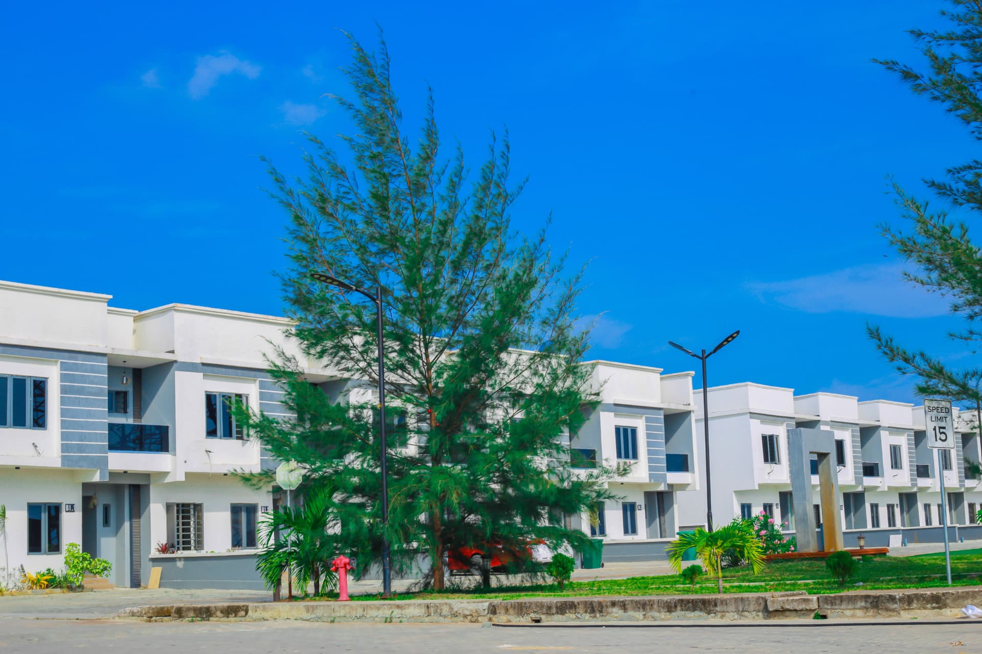 Terrace homes and landscaped street at The Estate in Ajah